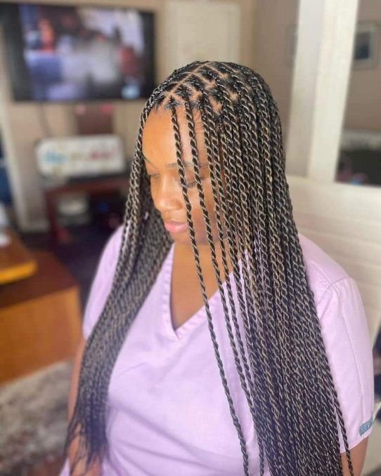 Beautiful braided hairstyle at Goshen Hair Braiding & Supply